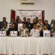 पुष्पांजलि सभागार, लोहामंडी में आमंत्रण पत्र का विमोचन करते गणमान्य अतिथि।
